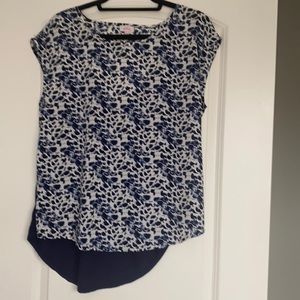 Will be donated 10/01. 
Blue leopard top. Excellent condition.